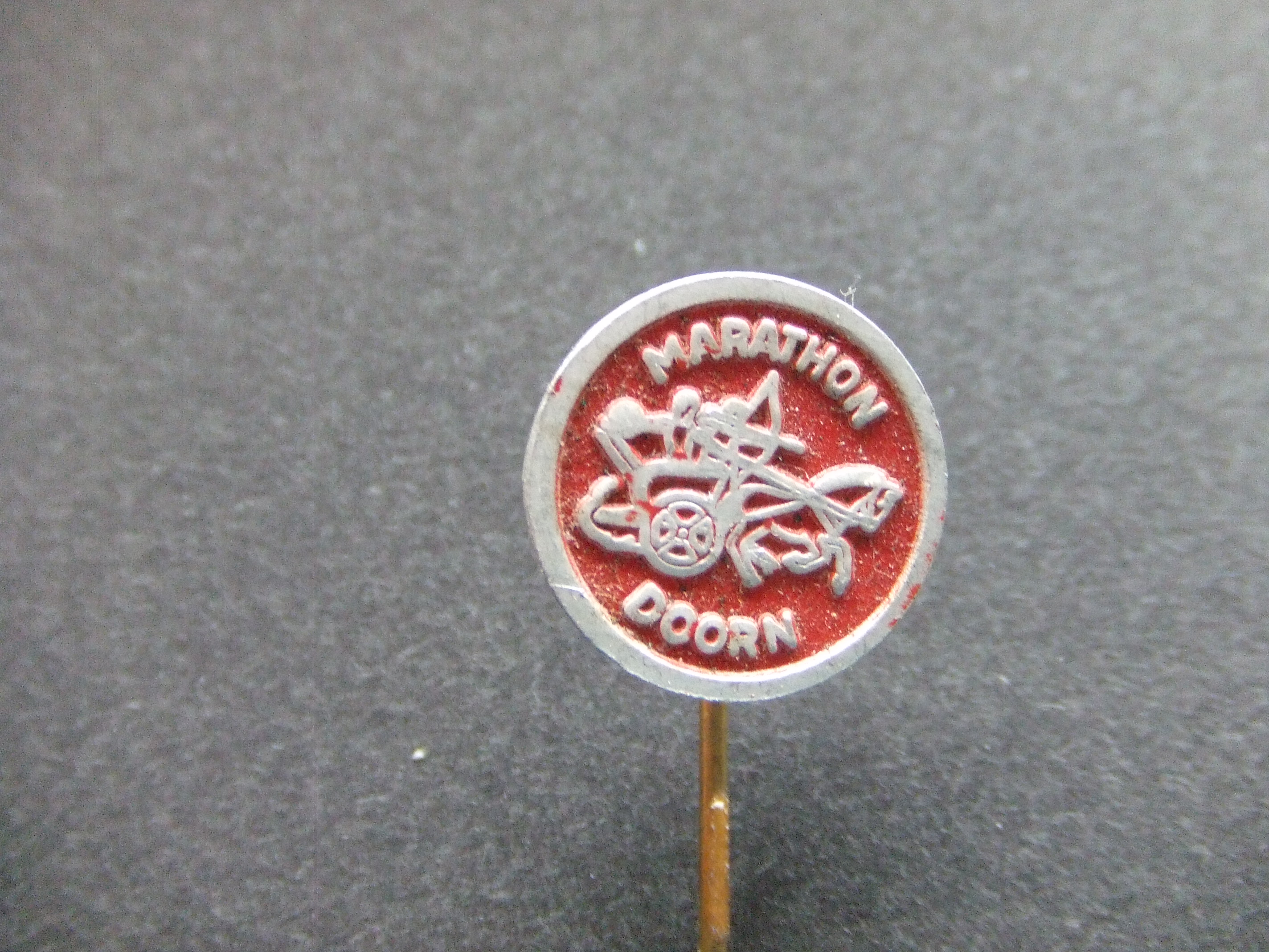 S.c. Marathon Doorn handboogvereniging.logo strijder rood